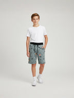 OLIVE LYCRA PRINT SHORTS WITH 2 SIDE ZIPPERS