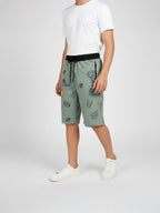OLIVE LYCRA PRINT SHORTS WITH 2 SIDE ZIPPERS